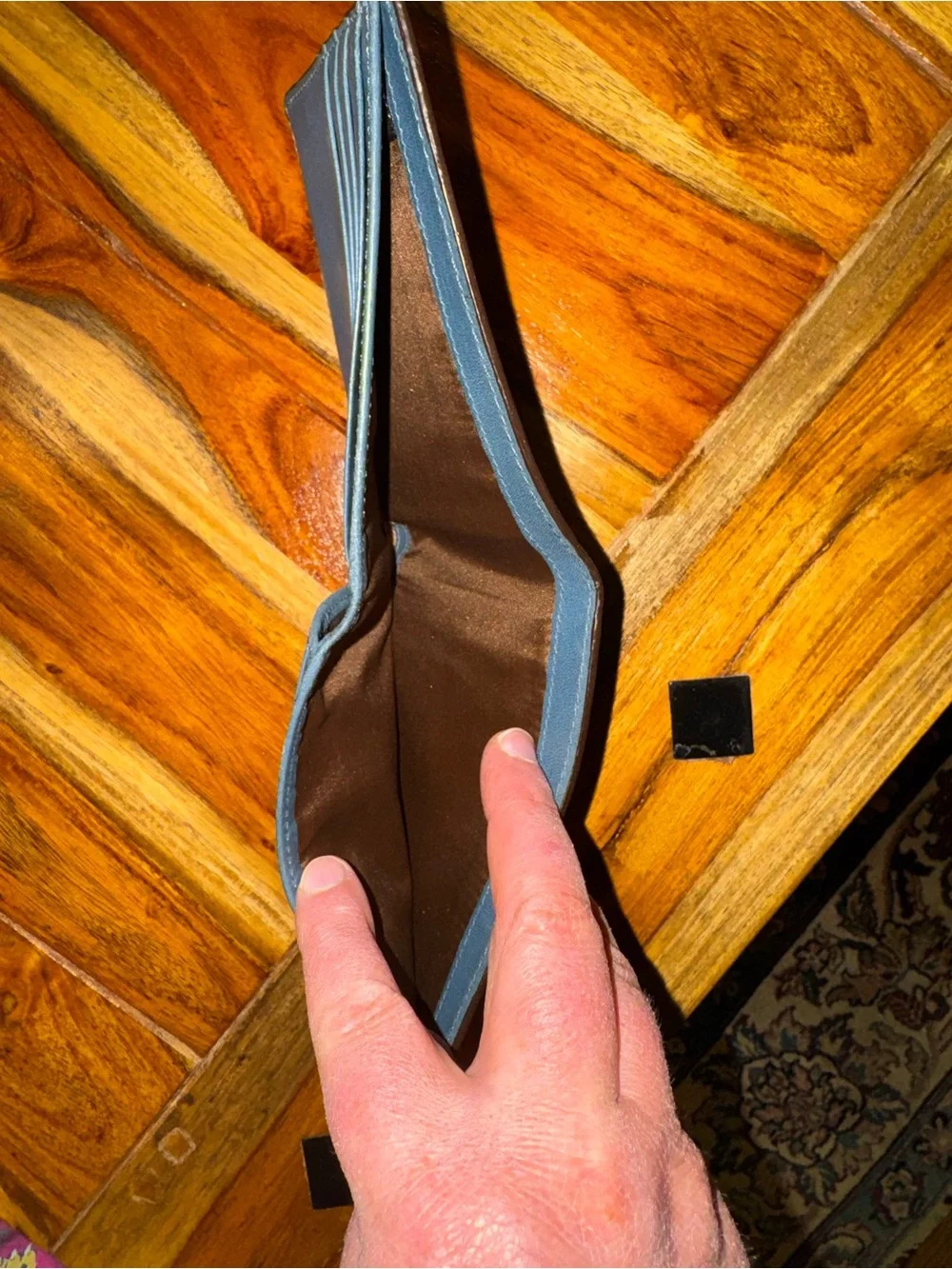 Beautiful blue and brown Coach men’s style leather wallet